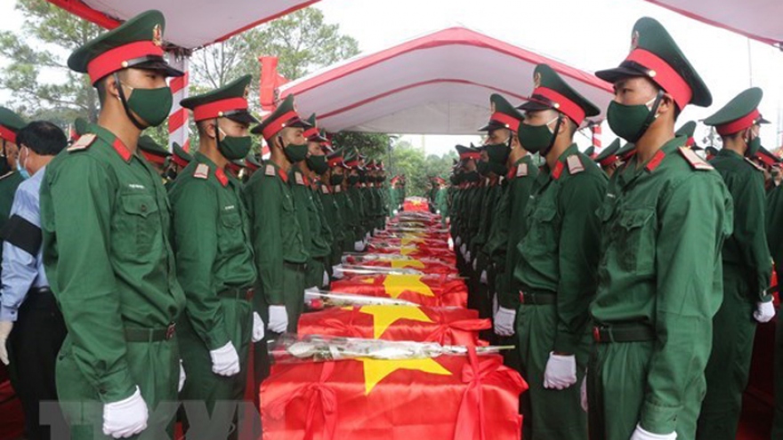 Remains of martyrs repatriated from Laos reburied in Nghe An, Thanh Hoa